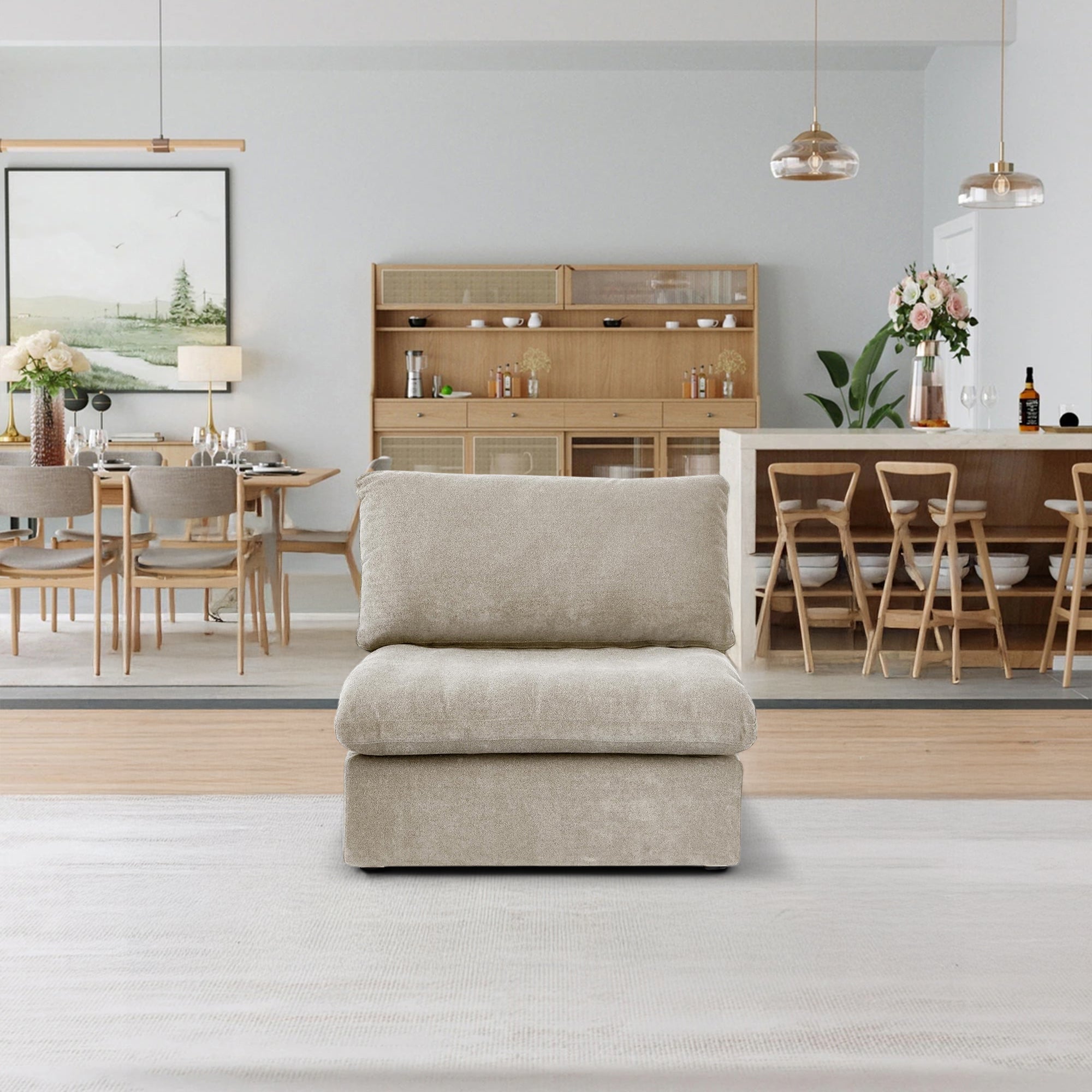 The Sofatica® Middle Armless Cloud Couch in Beige | Premium Version features removable fabric covers and is centered in a modern dining room with wooden furniture, pendant lights, and neutral decor.