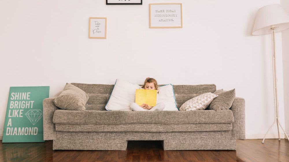 Minimalist living room with clean-silhouette white sofa