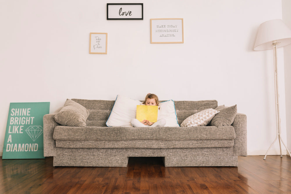 Minimalist living room with clean-silhouette white sofa
