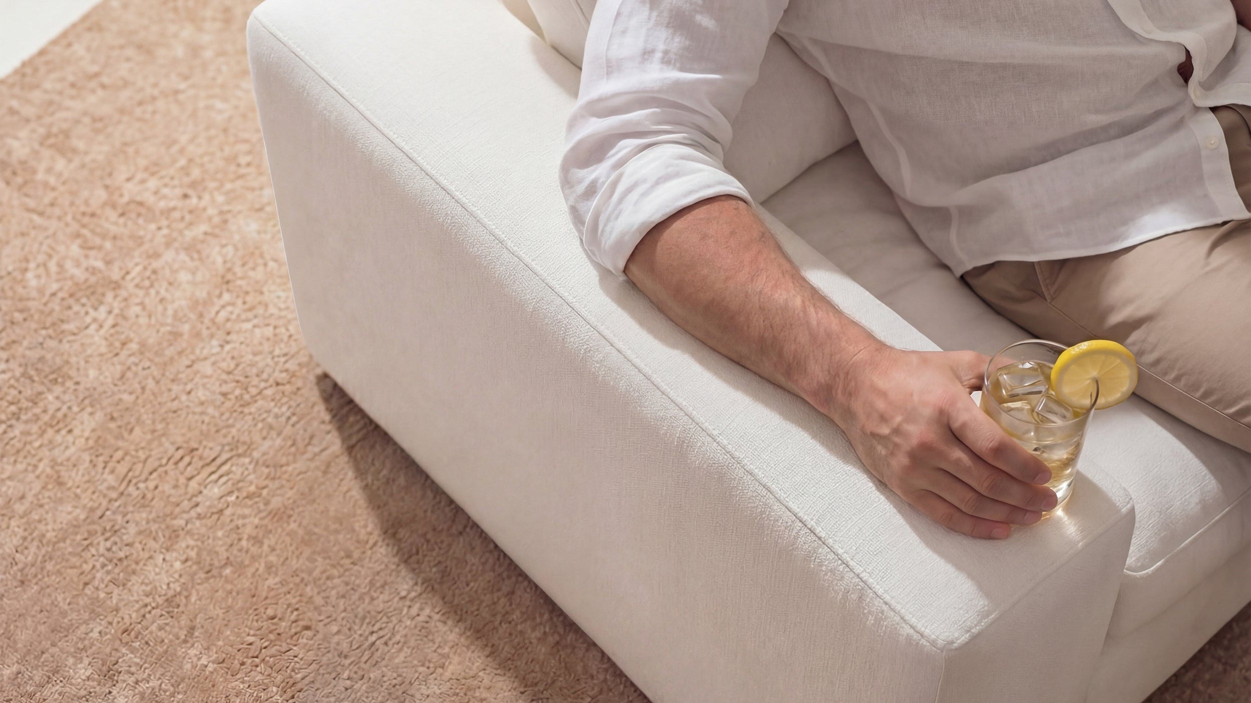 Sunroom with a light-toned UV-resistant sofa