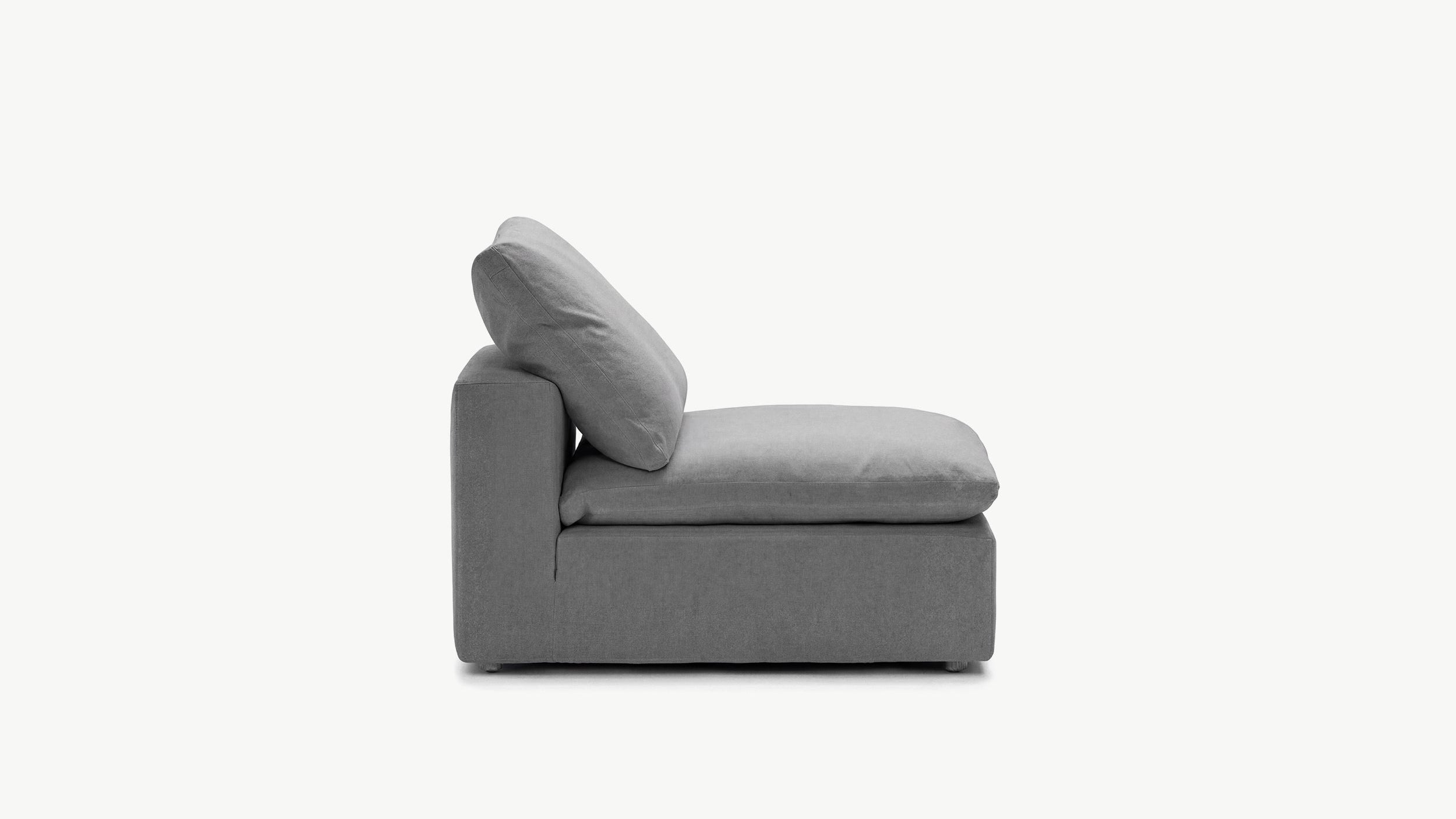Armless anthracite sofa in a compact living room