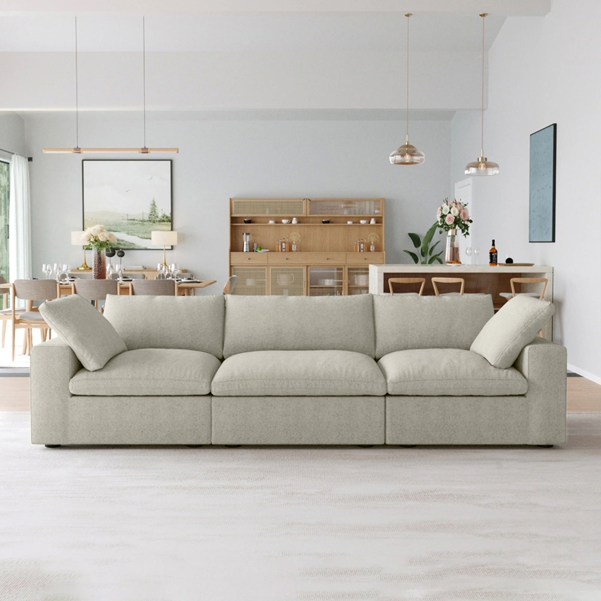 Modern 3-seat beige sofa under $1500 in a bright living room