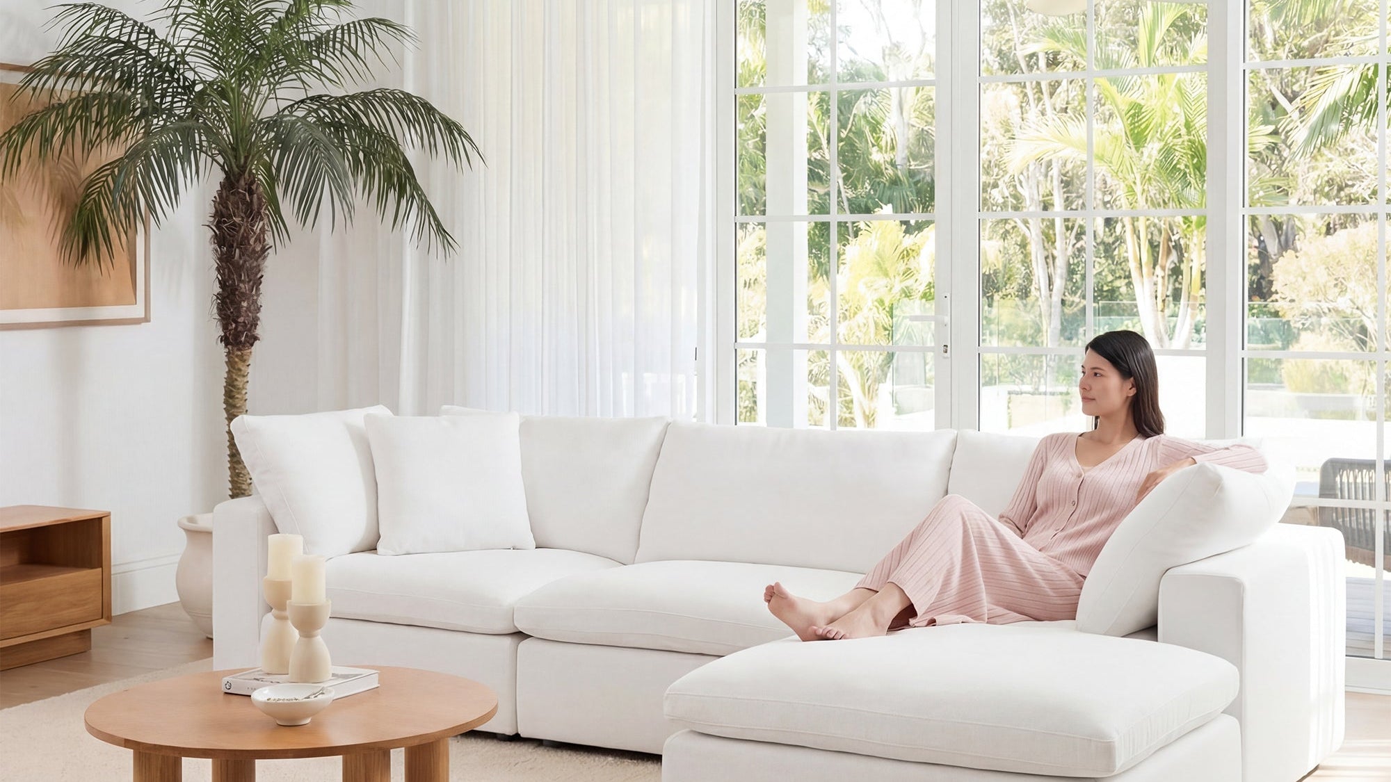 Cloud couch sectional arranged in an L-shape in a modern living room