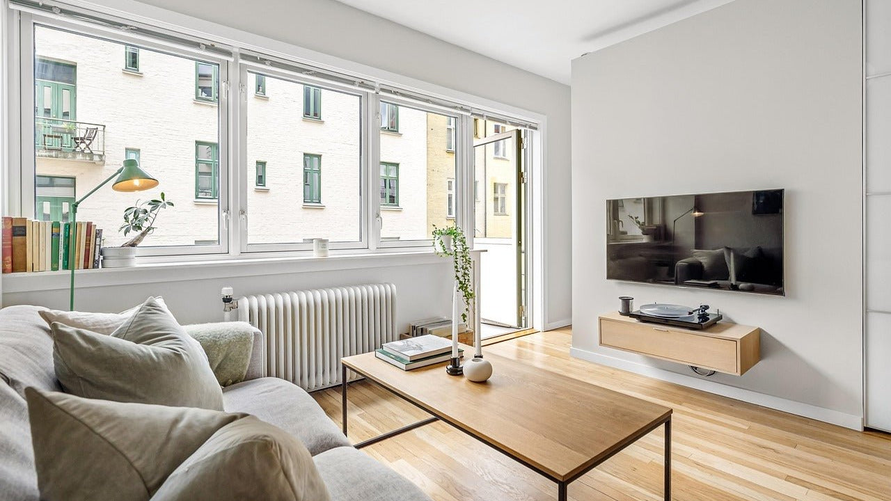 Sofa facing TV in living room 