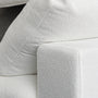 Close-up of the CloudForm™ 4-Seater Modular L-Sofa in white, featuring Goose Down Comfort, removable washable Crypton® fabric covers on armrest, seat, and back cushions, plus a secure ModuleSecure™ system.