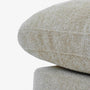 Close-up of two stacked CloudForm™ Middle Armless Modular Sofa pieces in beige with washable Crypton® fabric and ModuleSecure™ system, set against a plain white background.