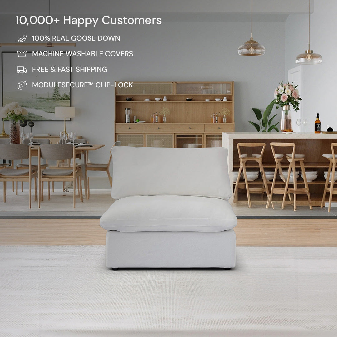 The CloudForm™ Middle Armless Modular Sofa in white features handcrafted birch wood accents, goose down filling, washable removable covers, modular compatibility, and fast shipping—perfect for modern neutral-toned living or dining areas.