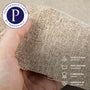 A hand holds beige CloudForm™ Ottoman Modular Sofa fabric. Icons and text highlight its stain & liquid resistance, machine washability, commercial grade durability, and pet-friendliness. The Perennials logo is visible.