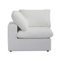 The CloudForm™ 4-Seater Modular L-Sofa in white features plush goose down cushions, removable washable Crypton® fabric covers, and a secure ModuleSecure™ system—shown here is a side view of its modern upholstered corner chair module.