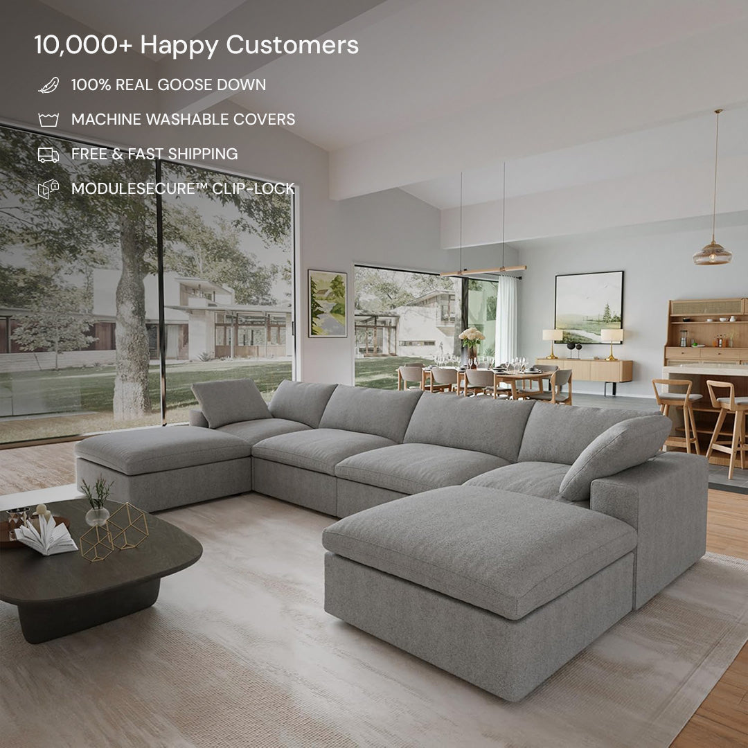 Modern living room with a CloudForm™ 4-Seater + Ottoman Modular U-Sofa in gray, wooden coffee table, and dining area. The modular sofa features removable fabric covers and is praised for top-rated customer satisfaction.